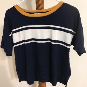 Navy blue tee shirt with yellow accent